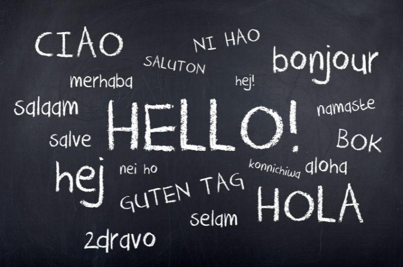 hello written in languages on chalkboard