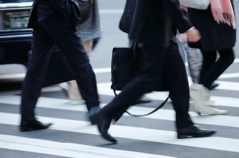 commuters on sidewalk