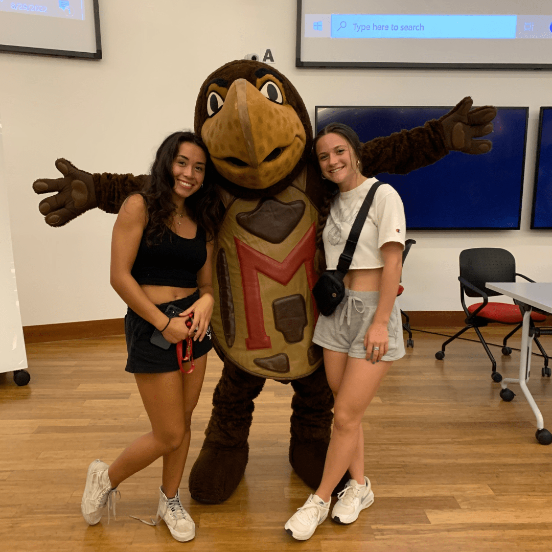 Two Carillon students with Testudo